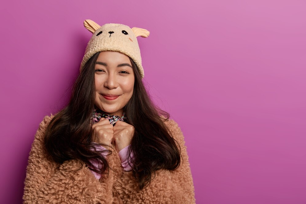 photo-teenage-girl-wears-fashionable-hat-brown-coat-looks-sincerely-with-gentle-smile-enjoys-wearing-new-outfit_273609-38861.jpg